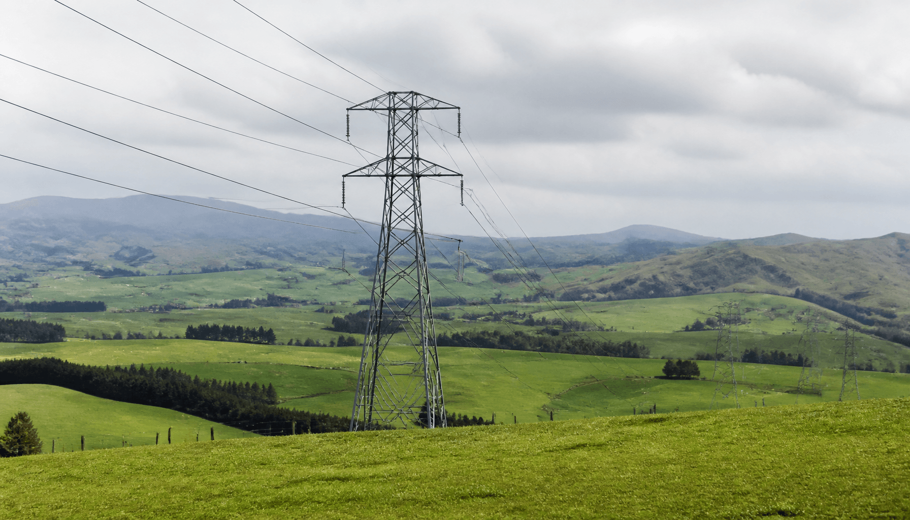 High-voltage transmission lines crossing New Zealand farmland