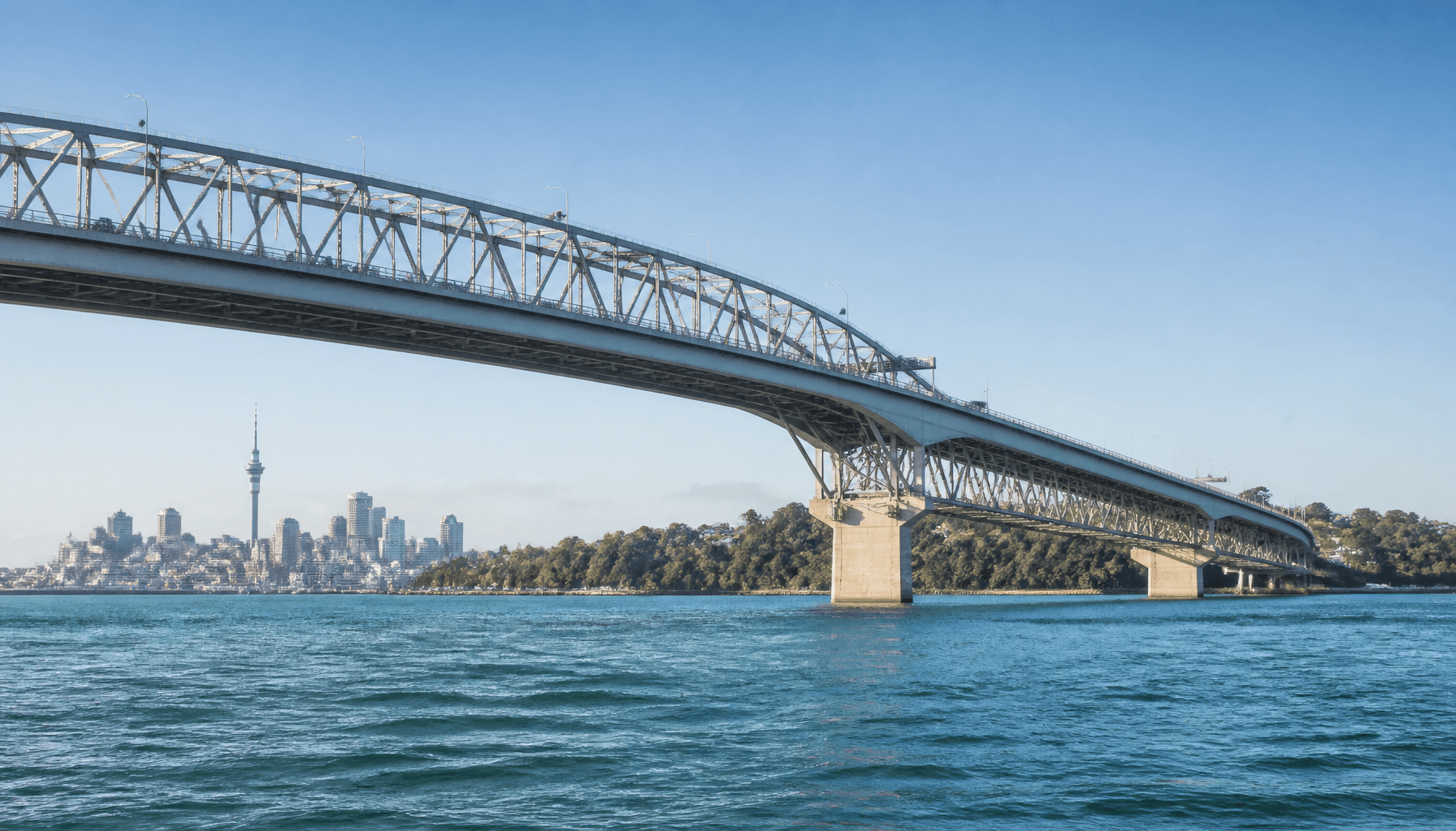 Auckland Harbour Bridge spanning the Waitematā Harbour under clear morning light