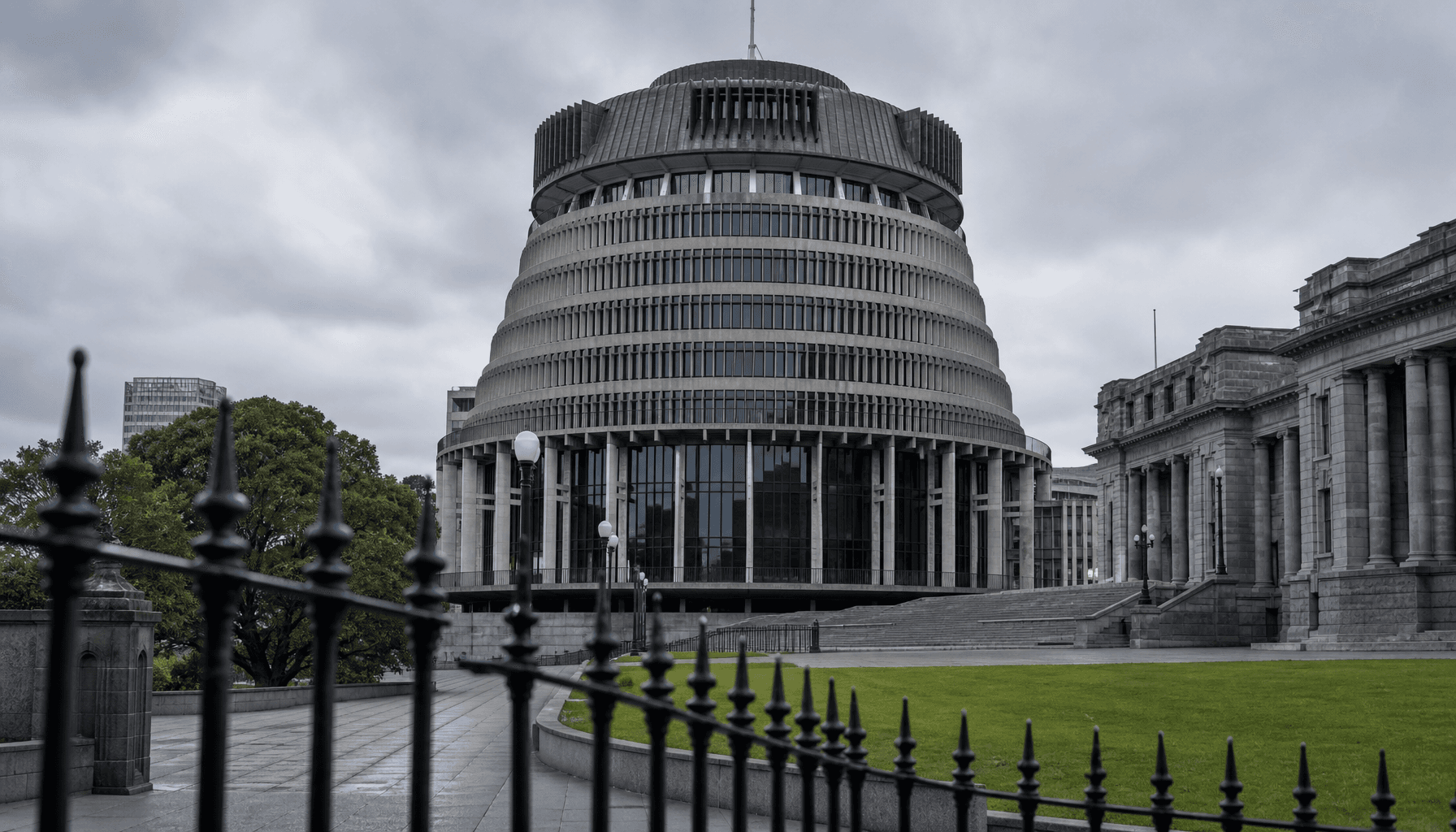 The Beehive executive wing of New Zealand's Parliament in Wellington under overcast midday light